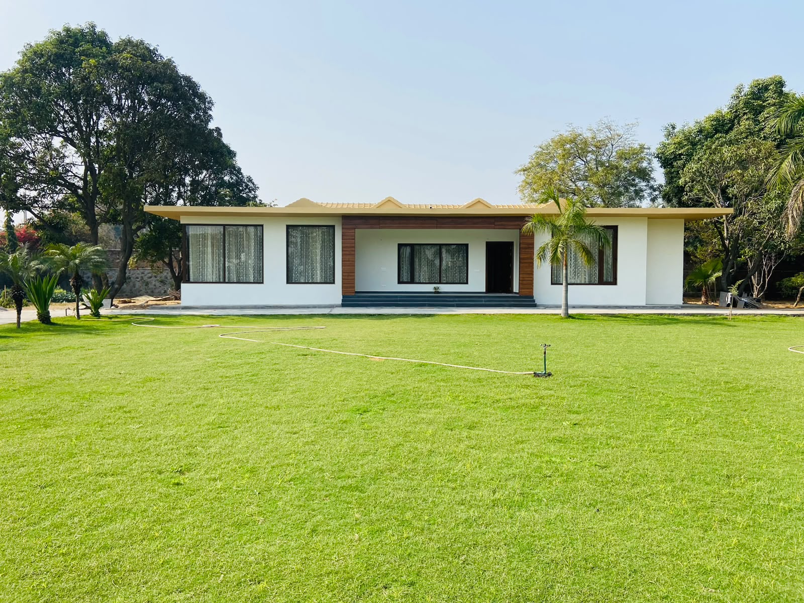 Agricultural Land with Farmhouse & Landscaped Lawn